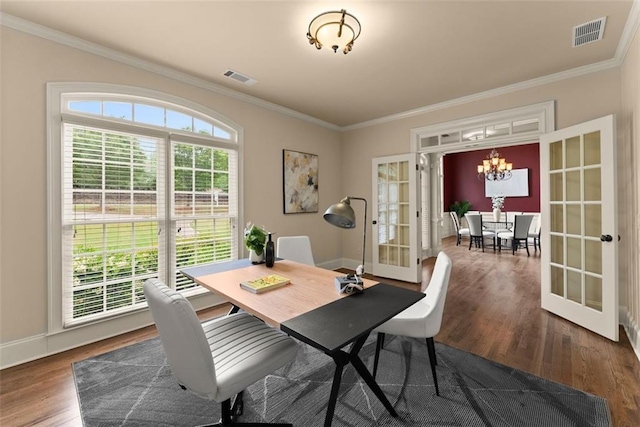 dining room with a notable chandelier, visible vents, ornamental molding, and french doors