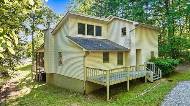 rear view of property with a deck