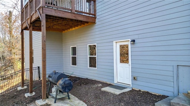 entrance to property featuring a deck