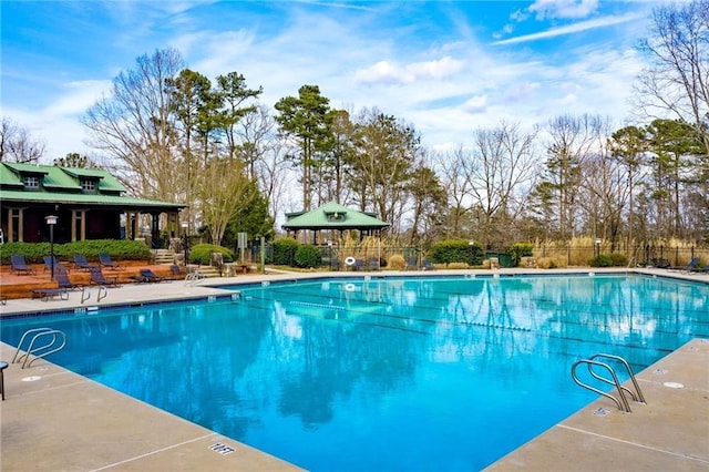 view of swimming pool featuring a patio