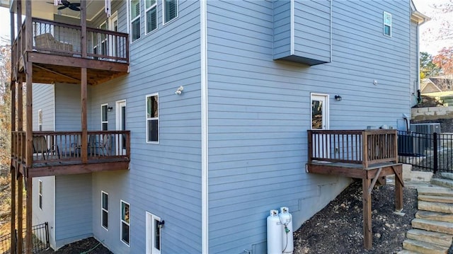 view of property exterior featuring ceiling fan