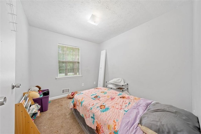 1991 Flat Shoals Rd, Riverdale, GA 30296 - bedroom featuring carpet flooring and a textured ceiling