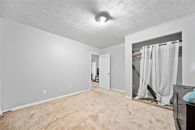 1991 Flat Shoals Rd, Riverdale, GA 30296 - unfurnished bedroom with carpet flooring, a textured ceiling, and a closet