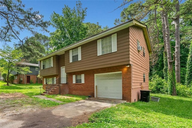 1991 Flat Shoals Rd, Riverdale, GA 30296 - bi-level home with a garage, brick siding, a front yard, and asphalt driveway
