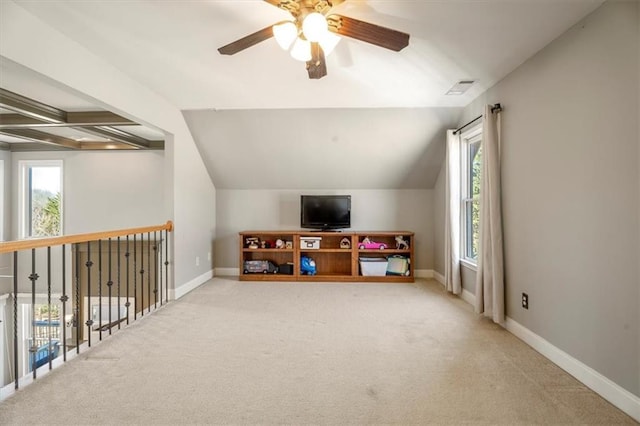 bonus room with lofted ceiling, a healthy amount of sunlight, and carpet floors