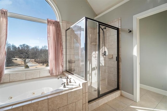 bathroom featuring lofted ceiling, a wealth of natural light, tile patterned floors, and shower with separate bathtub