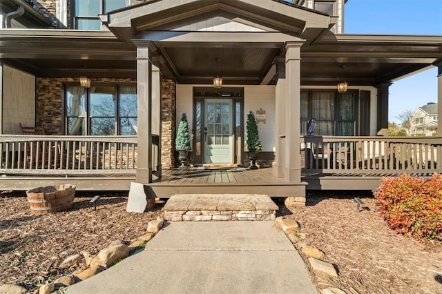 doorway to property with covered porch