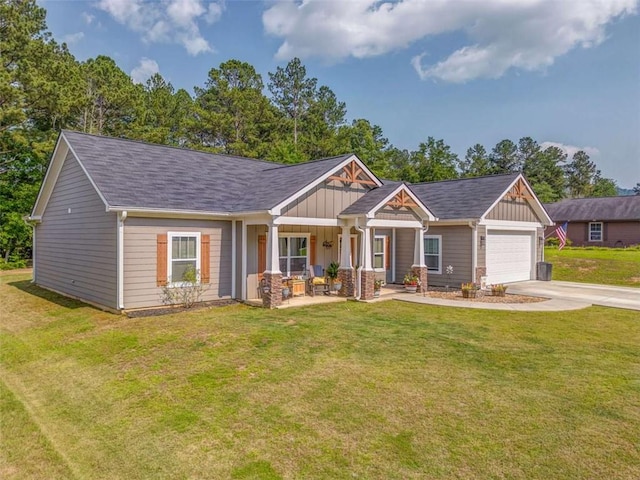 22 Gowen Dr, Rome, GA 30165 - craftsman house with board and batten siding, a porch, concrete driveway, a garage, and a front lawn