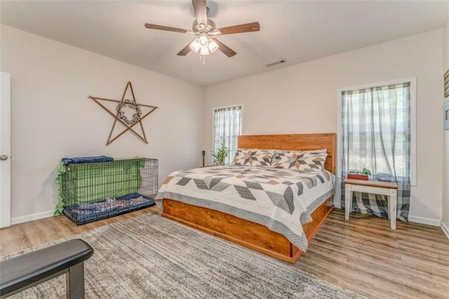 22 Gowen Dr, Rome, GA 30165 - bedroom with wood finished floors, baseboards, and ceiling fan
