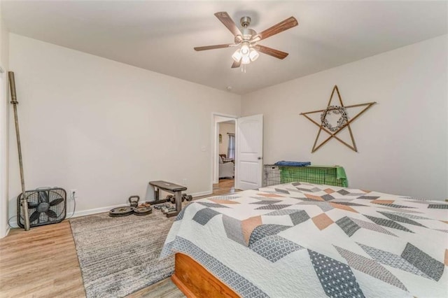 22 Gowen Dr, Rome, GA 30165 - bedroom featuring wood finished floors, baseboards, and ceiling fan