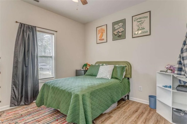 22 Gowen Dr, Rome, GA 30165 - bedroom with wood finished floors, baseboards, and a ceiling fan