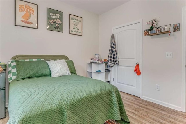 22 Gowen Dr, Rome, GA 30165 - bedroom with wood finished floors and baseboards