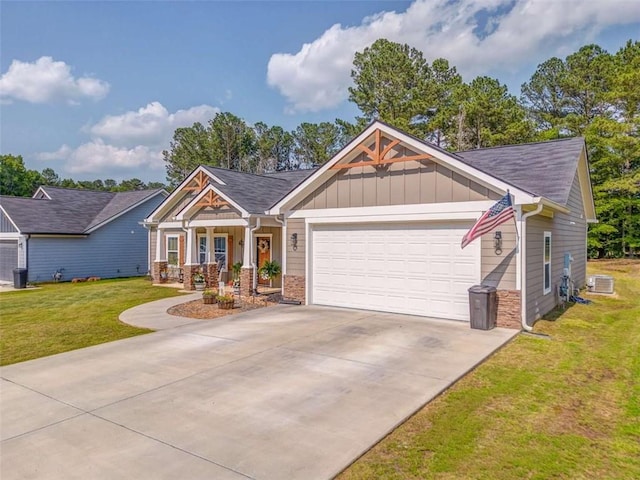 22 Gowen Dr, Rome, GA 30165 - craftsman-style home featuring board and batten siding, an attached garage, a front lawn, driveway, and central AC unit