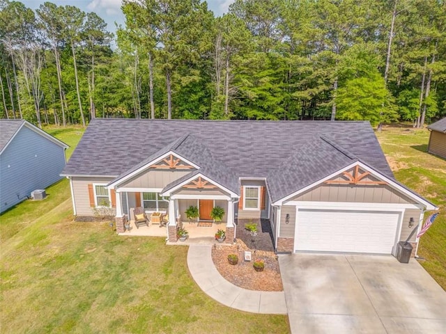 22 Gowen Dr, Rome, GA 30165 - view of front of property with board and batten siding, driveway, a garage, and a front lawn
