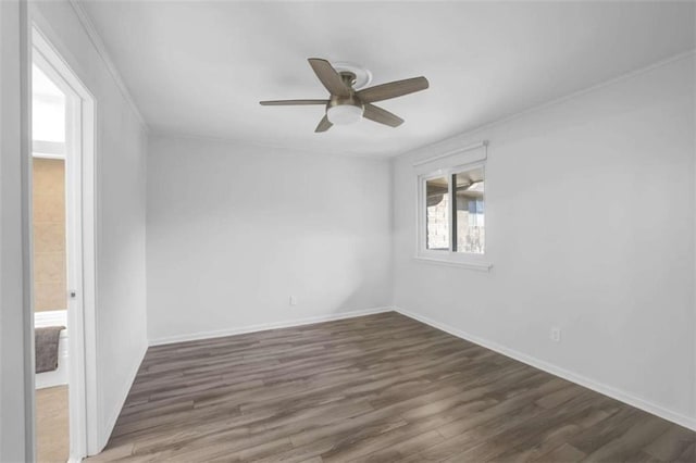 unfurnished room with dark hardwood / wood-style floors and ceiling fan