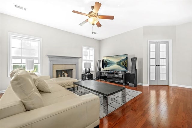 2625 Blackstock Dr, Cumming, GA 30041 - living room with french doors, baseboards, visible vents, a ceiling fan, and hardwood / wood-style flooring