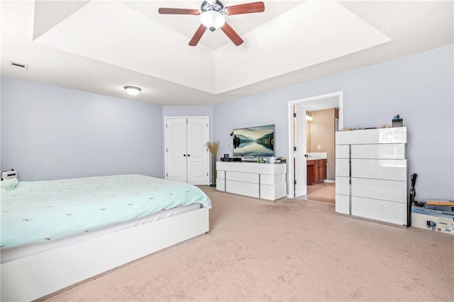 2625 Blackstock Dr, Cumming, GA 30041 - bedroom with visible vents, light colored carpet, a closet, ensuite bath, and a raised ceiling