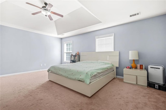 2625 Blackstock Dr, Cumming, GA 30041 - carpeted bedroom with ceiling fan, baseboards, a tray ceiling, and visible vents