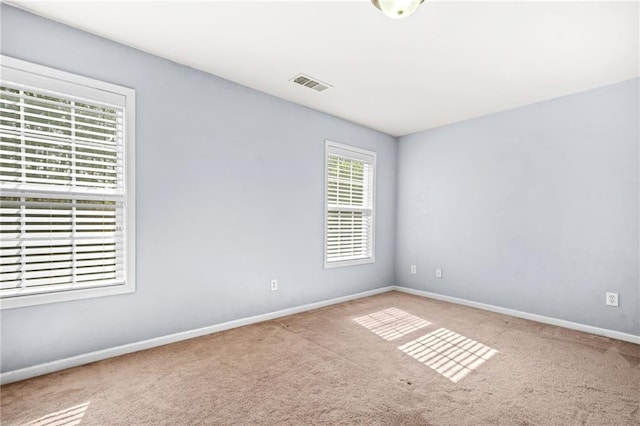 2625 Blackstock Dr, Cumming, GA 30041 - carpeted spare room featuring baseboards and visible vents