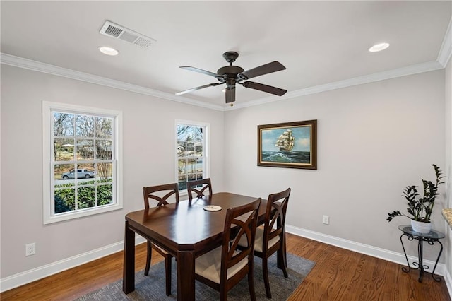 260 Mansell Cir, Roswell, GA 30075 - dining space with dark wood-style floors, visible vents, and ornamental molding