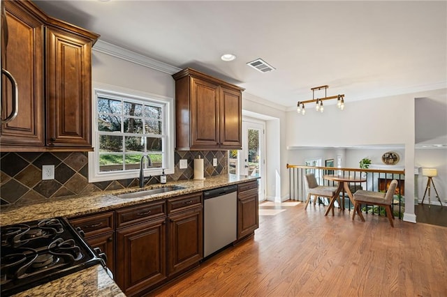 260 Mansell Cir, Roswell, GA 30075 - kitchen featuring visible vents, crown molding, stainless steel dishwasher, wood finished floors, and a sink
