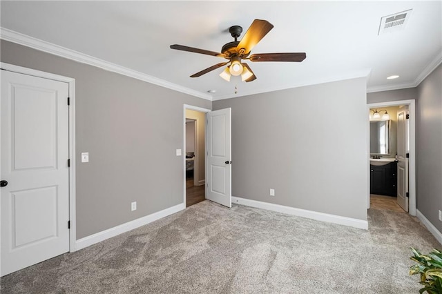 260 Mansell Cir, Roswell, GA 30075 - unfurnished bedroom featuring visible vents, ensuite bath, crown molding, baseboards, and light colored carpet