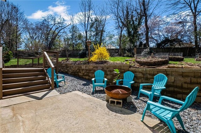 260 Mansell Cir, Roswell, GA 30075 - view of patio with a fire pit and fence