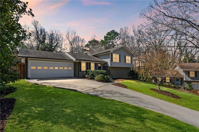 260 Mansell Cir, Roswell, GA 30075 - split level home with a front lawn, an attached garage, and driveway