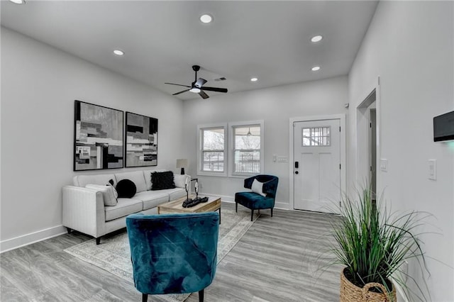 543 Paines Ave NW, Atlanta, GA 30318 - living area featuring a ceiling fan, recessed lighting, baseboards, and wood finished floors