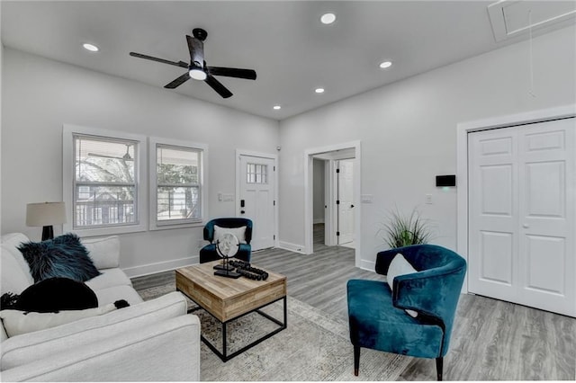 543 Paines Ave NW, Atlanta, GA 30318 - living room featuring light wood-type flooring, attic access, and recessed lighting