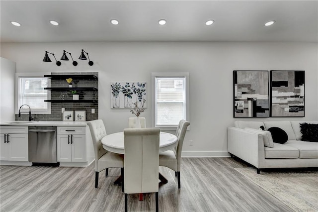 543 Paines Ave NW, Atlanta, GA 30318 - dining room featuring baseboards, light wood finished floors, recessed lighting, and a healthy amount of sunlight