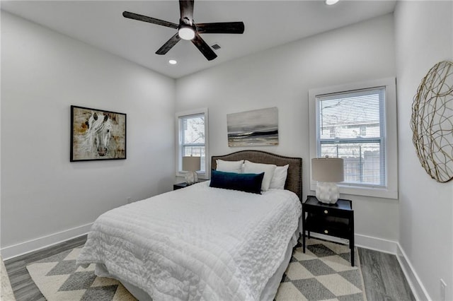 543 Paines Ave NW, Atlanta, GA 30318 - bedroom featuring recessed lighting, visible vents, ceiling fan, wood finished floors, and baseboards