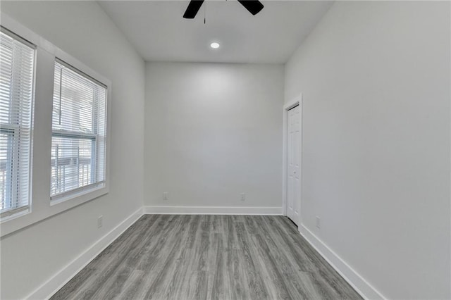 543 Paines Ave NW, Atlanta, GA 30318 - empty room featuring a ceiling fan, recessed lighting, light wood-style flooring, and baseboards