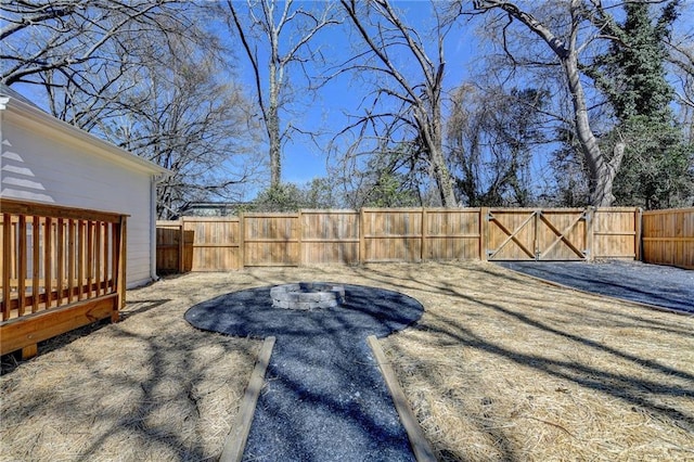 543 Paines Ave NW, Atlanta, GA 30318 - view of yard with a patio area, a fenced backyard, and a gate