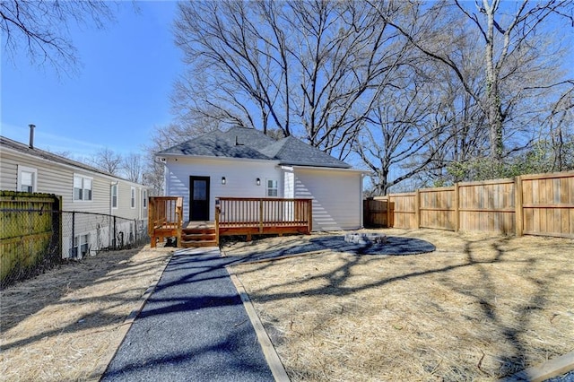 543 Paines Ave NW, Atlanta, GA 30318 - back of property with a fenced backyard and a wooden deck