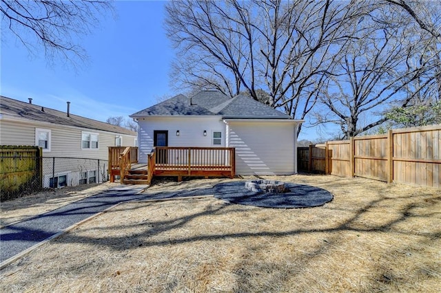 543 Paines Ave NW, Atlanta, GA 30318 - rear view of property featuring a fenced backyard and a wooden deck