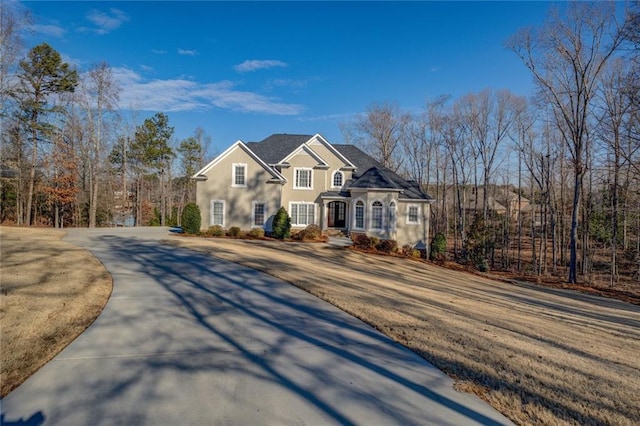 view of front of home with a front lawn