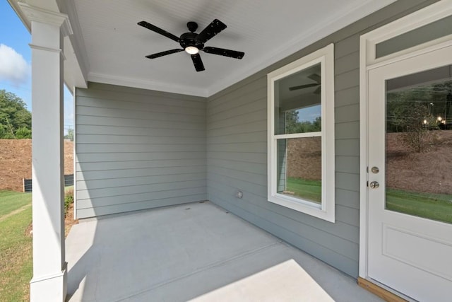 view of patio featuring ceiling fan