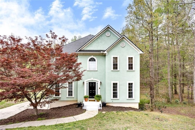 1772 Brittany Chase NW, Kennesaw, GA 30152 - view of front facade with stucco siding and a front yard