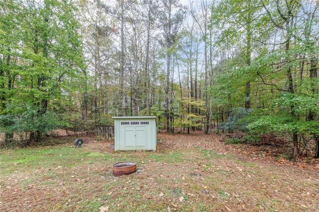 1772 Brittany Chase NW, Kennesaw, GA 30152 - view of yard featuring a wooded view