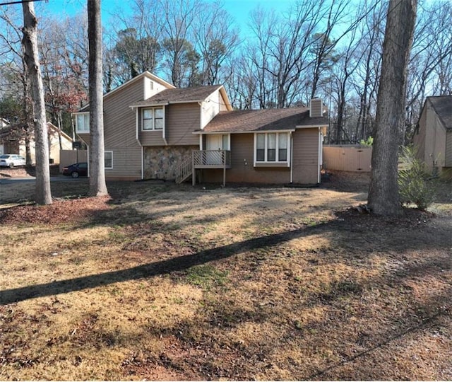 exterior space with a front lawn