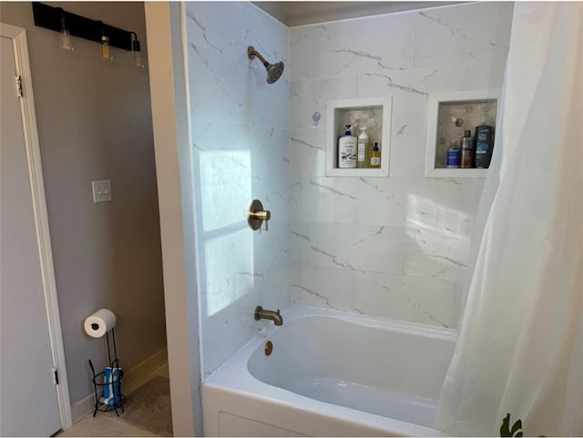 bathroom featuring shower / bathtub combination with curtain