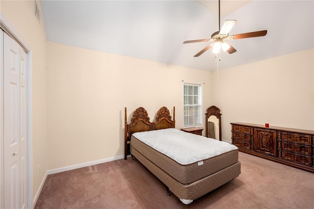 bedroom featuring carpet, a closet, visible vents, ceiling fan, and baseboards