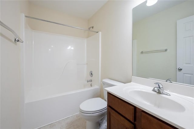 full bath featuring toilet, bathtub / shower combination, and vanity