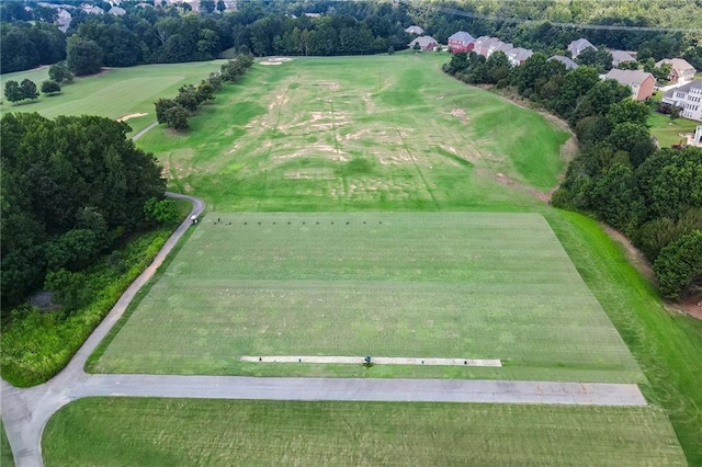 birds eye view of property featuring a rural view