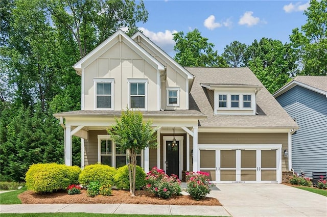 2434 Soft Maple St, Atlanta, GA 30360 - craftsman-style house with a shingled roof, driveway, covered porch, and an attached garage