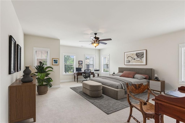 2434 Soft Maple St, Atlanta, GA 30360 - bedroom featuring light carpet, a desk, baseboards, and a ceiling fan
