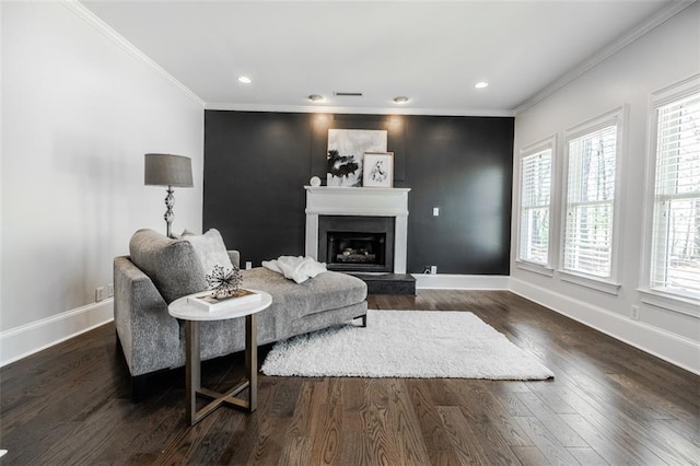 living room with crown molding and dark hardwood / wood-style floors