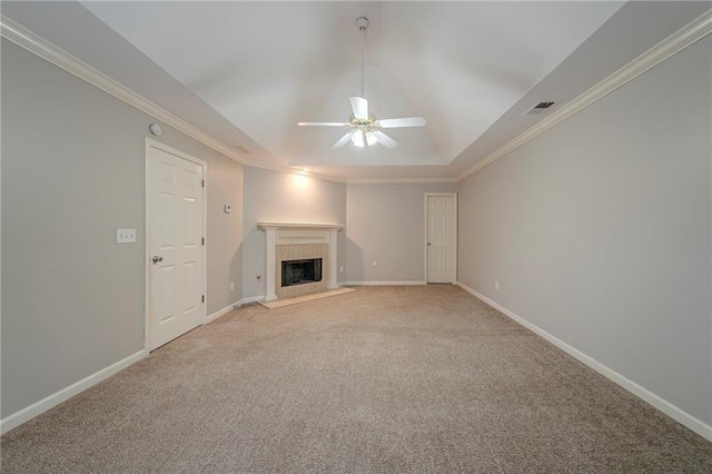 unfurnished living room featuring baseboards, visible vents, a tiled fireplace, and light colored carpet