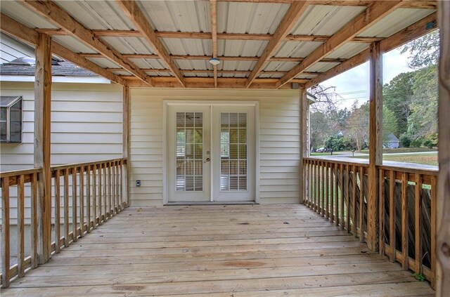 wooden terrace featuring french doors